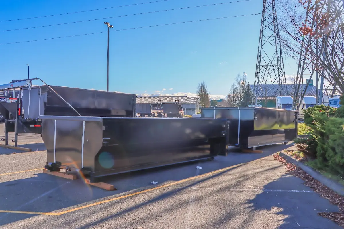 Roll-off dumpster ready for waste disposal at job site for 12 Yard Dumpster Rental in Evans